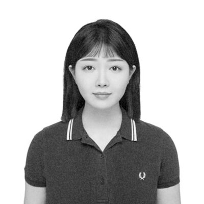 a black and white photo of a woman in a polo shirt